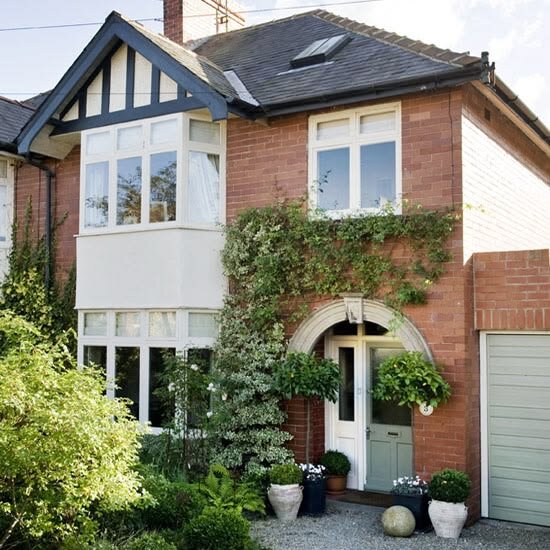 UK semi-detached house with a pristine tiled roof